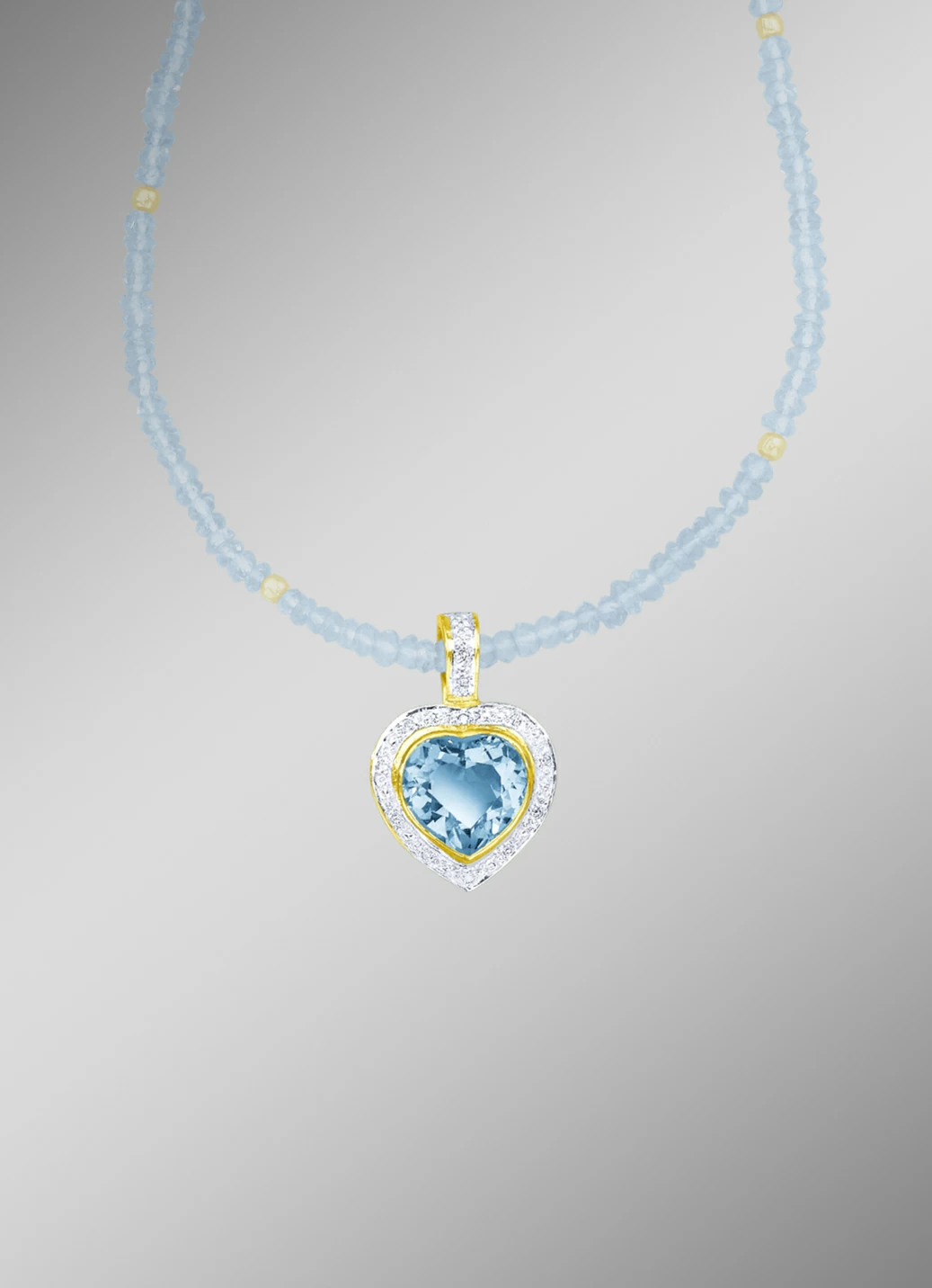 Anhänger mit Blautopas und Diamanten