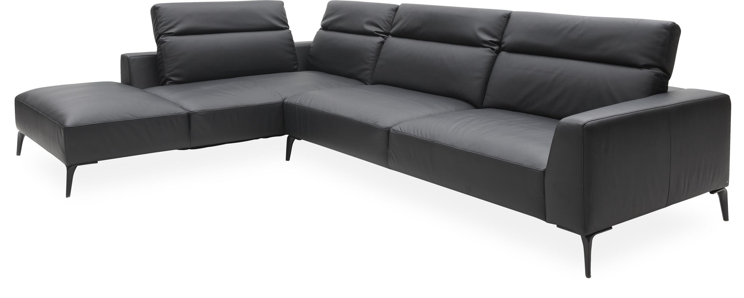 Volanti venstrevendt sofa med pufafslutning
