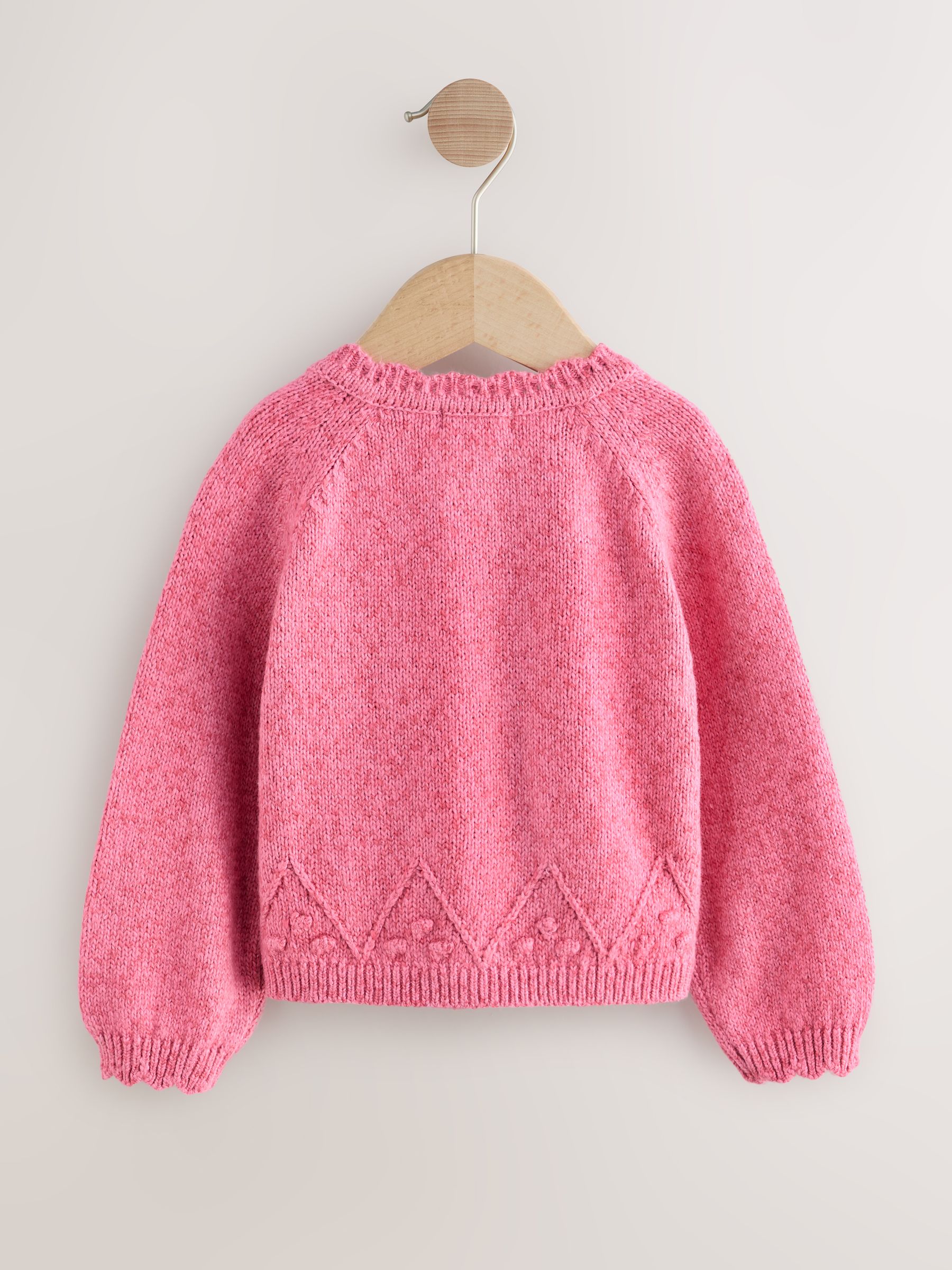 Roze - Vest met knopen (3mnd-7jr)