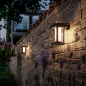 Philips solar wandlamp rond Camill zwart opaal licht met bewegingssensor