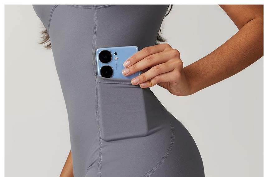 Skinniano - Yoga romper met spaghettibandjes en effen paneel