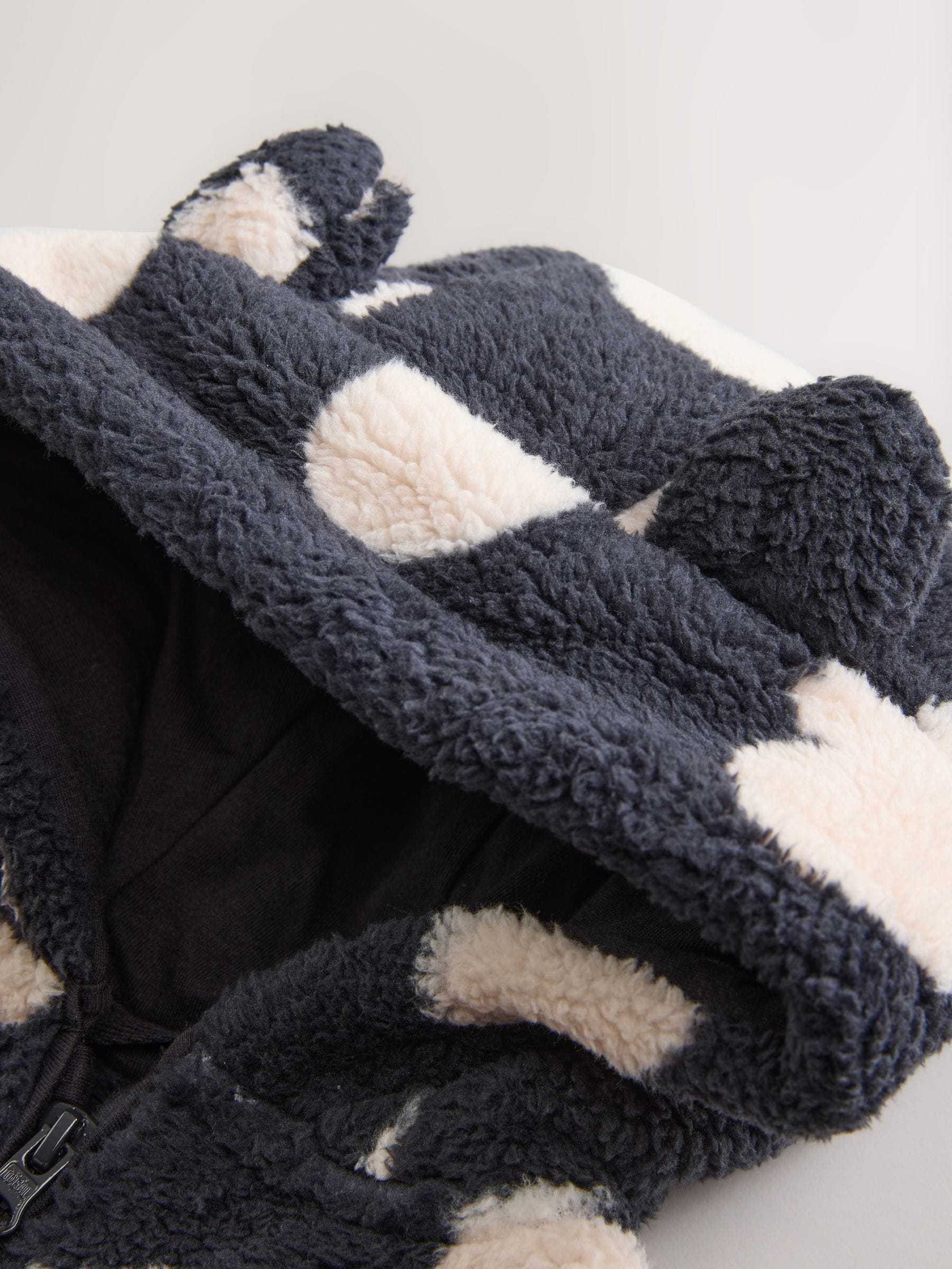 Zwart met hartjesprint - Fleece met ritssluiting (3mnd-7jr)