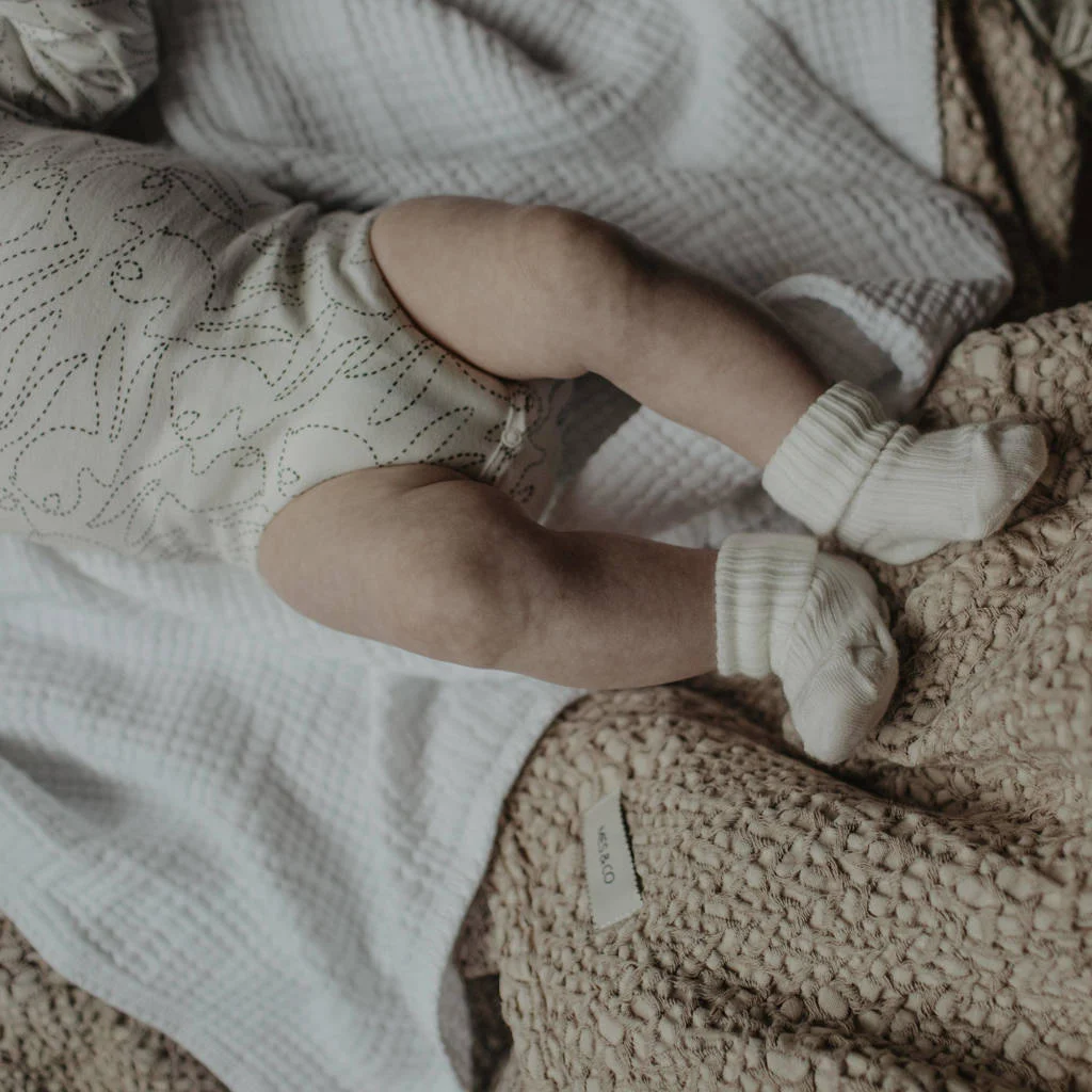 Mies & Co overslag romper Stiched bunny ecru/zwart