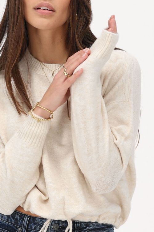 Beige trui met trekkoord