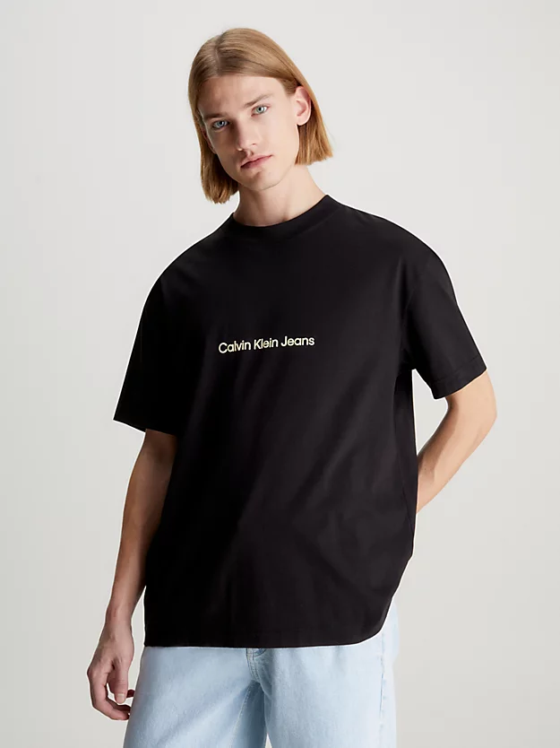 Camiseta de corte folgado com logotipo nas costas