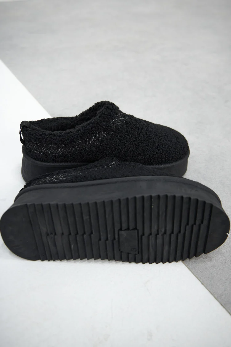 Bottines chaussons en peau de mouton compensés noires