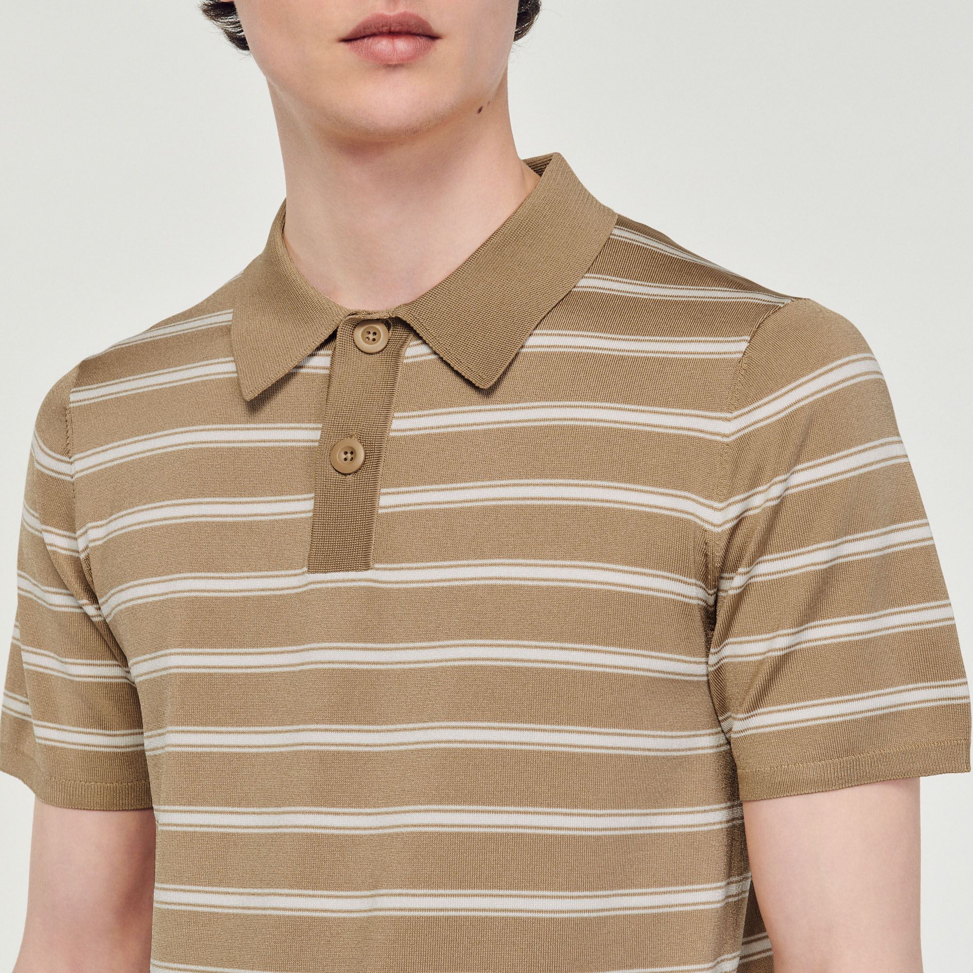 Polo á rayures