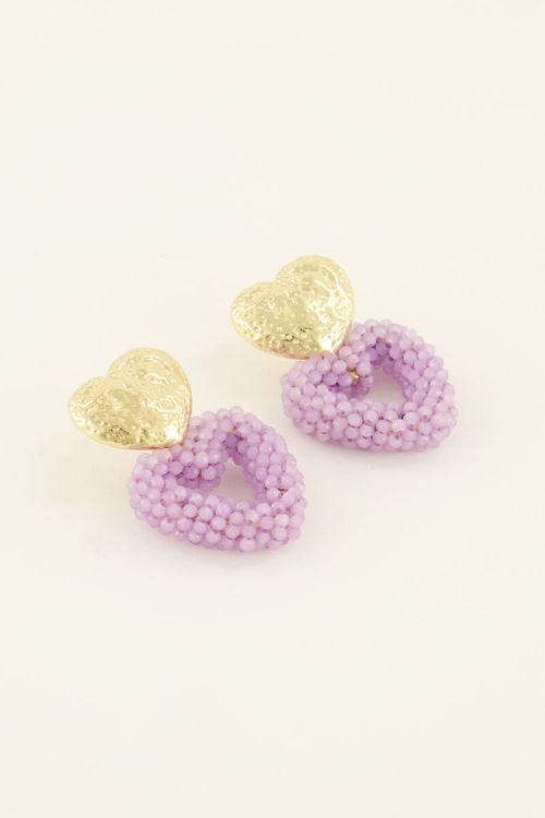 Statement hartjes oorbellen met goudkleurige knop