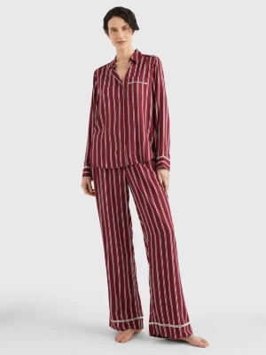 Calças de pijama com listras e logotipo em tom sobre tom