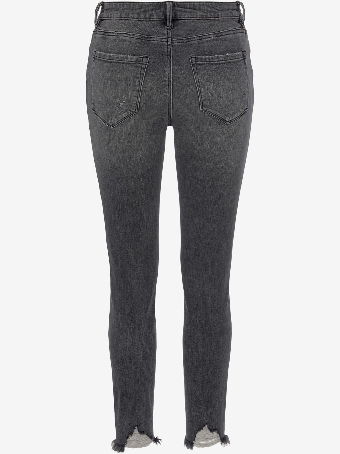 Jean effet déchiré jambes affinées