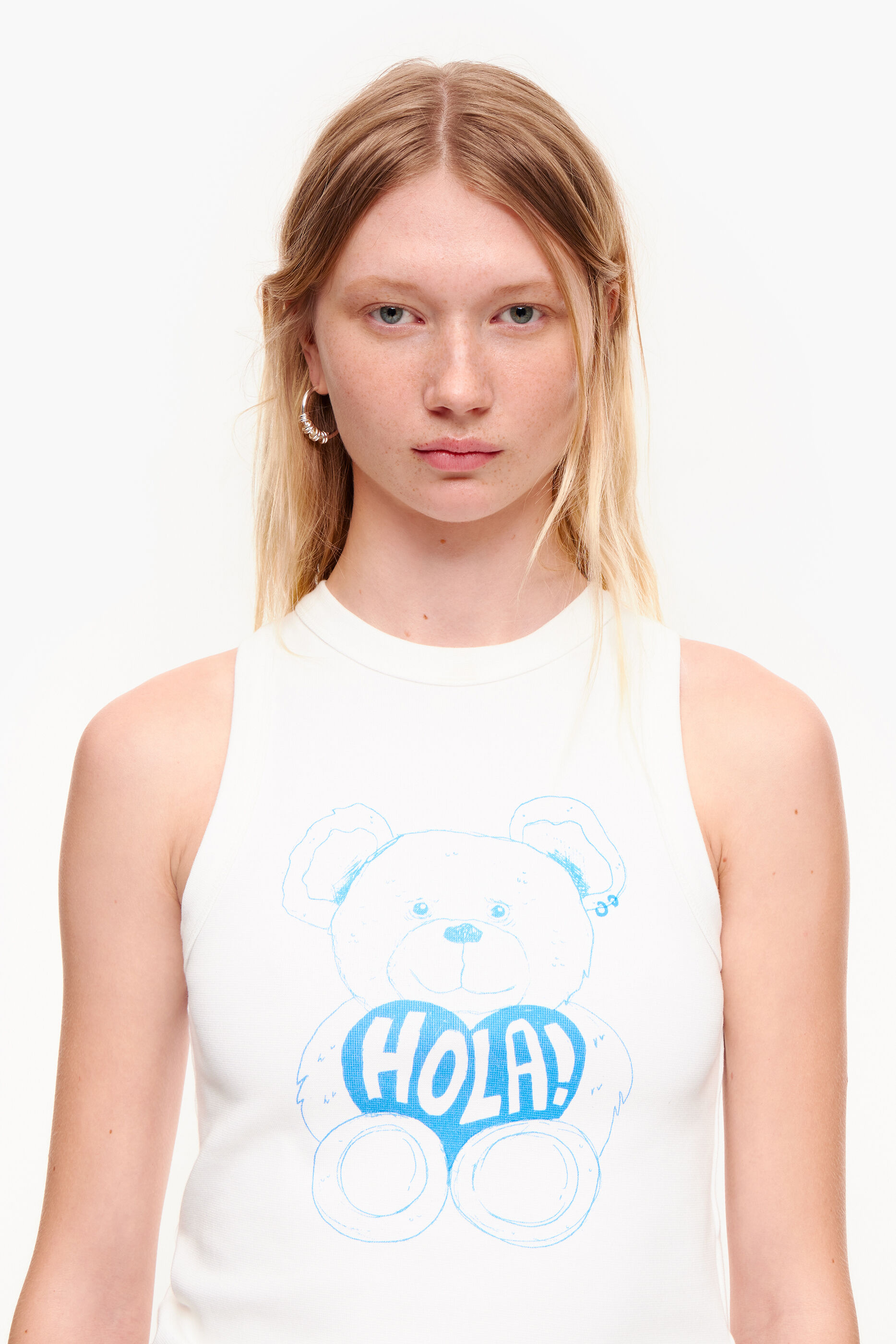 Urso de marfim com logotipo superior