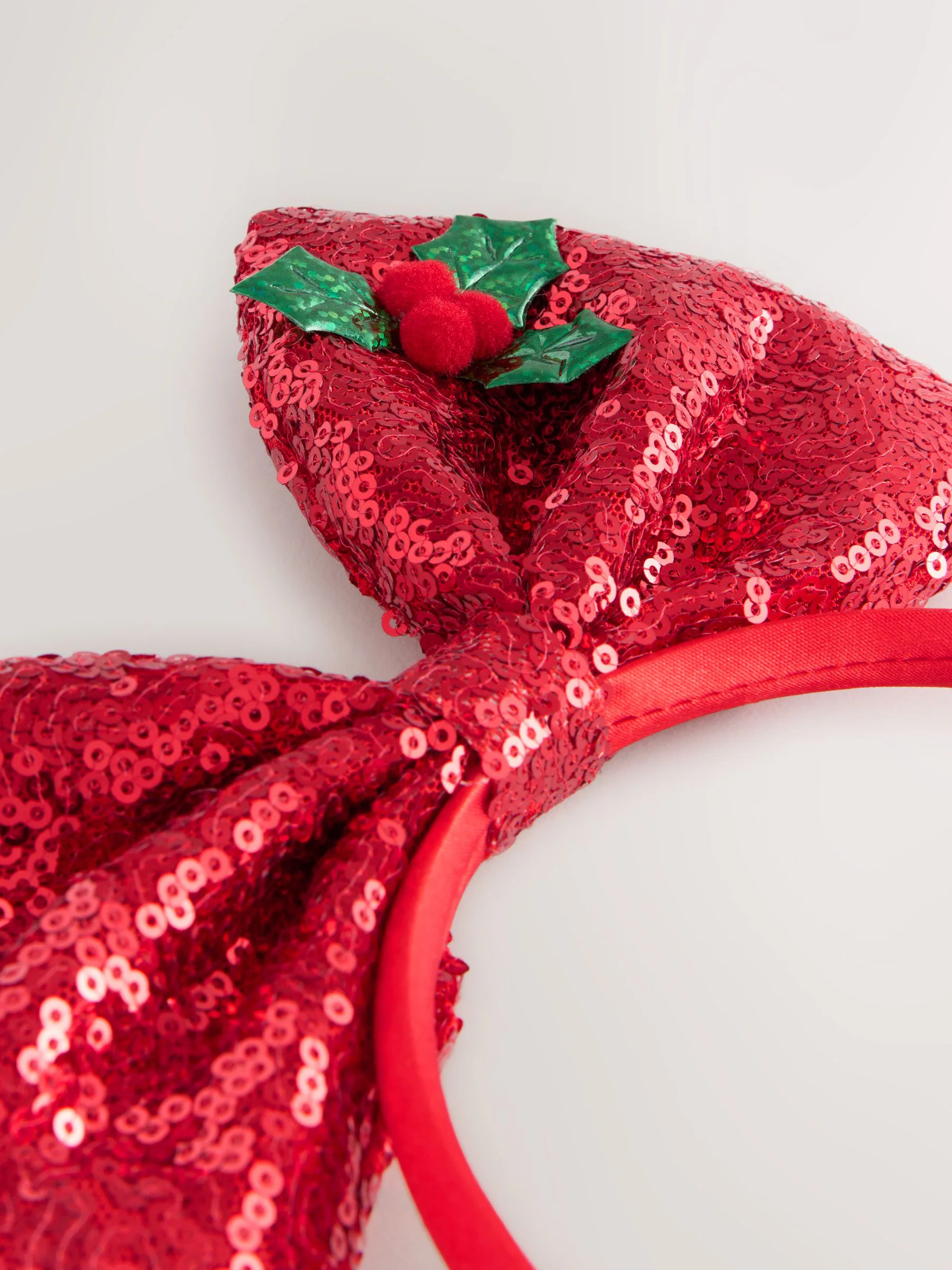 Rood - Haarband met kerststrik met pailletten