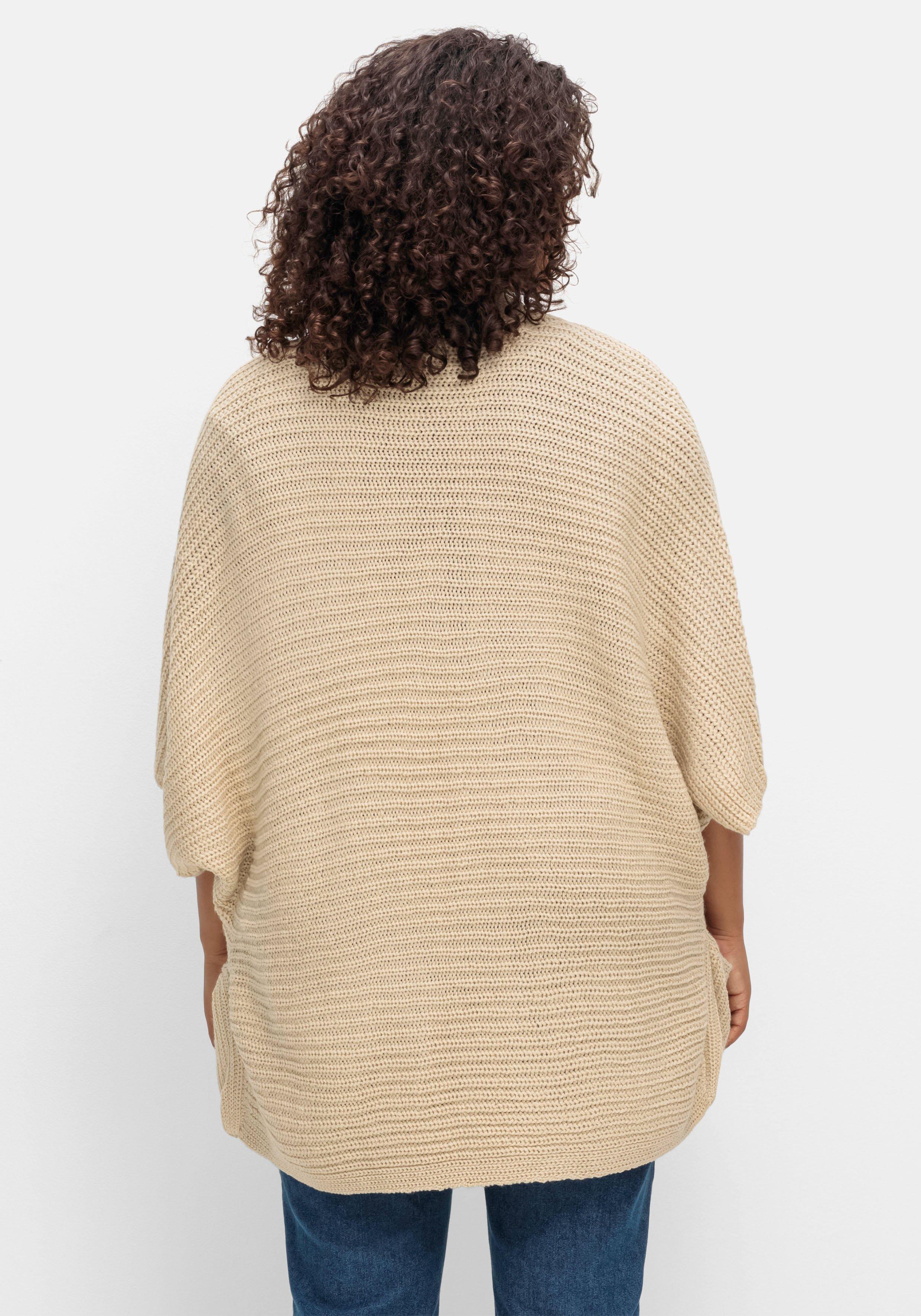 Strickjacke in offener Form, mit verkürztem Ärmel