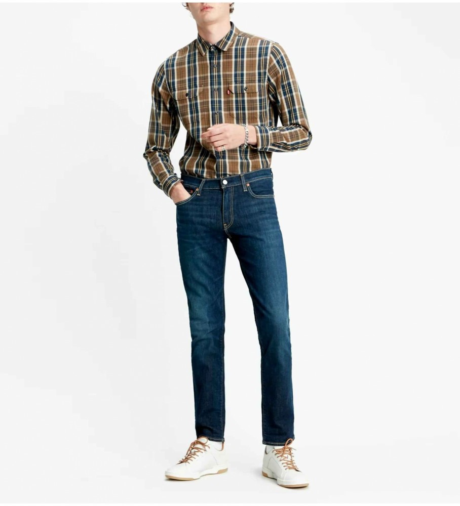 Calça jeans Levi's 511 azul, corte slim.