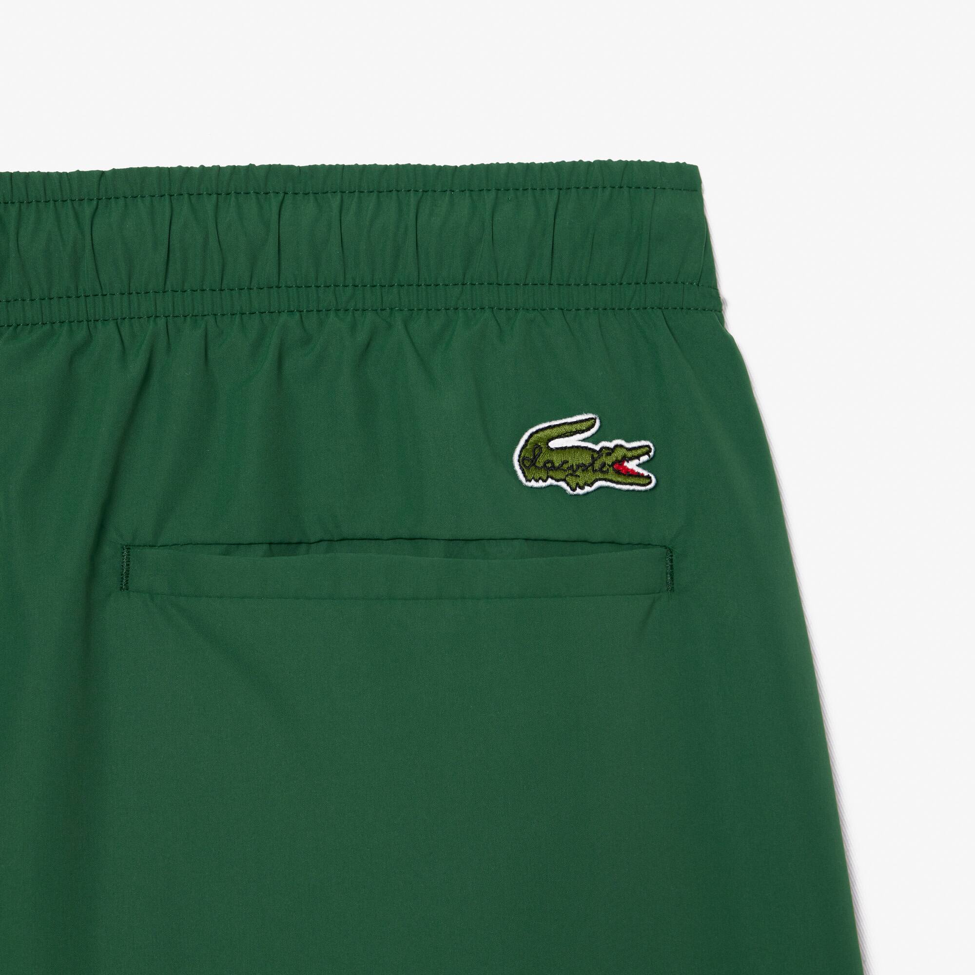 Mittellange Badehose mit Slogan Badebekleidung - Grün - Lacoste - Herren
