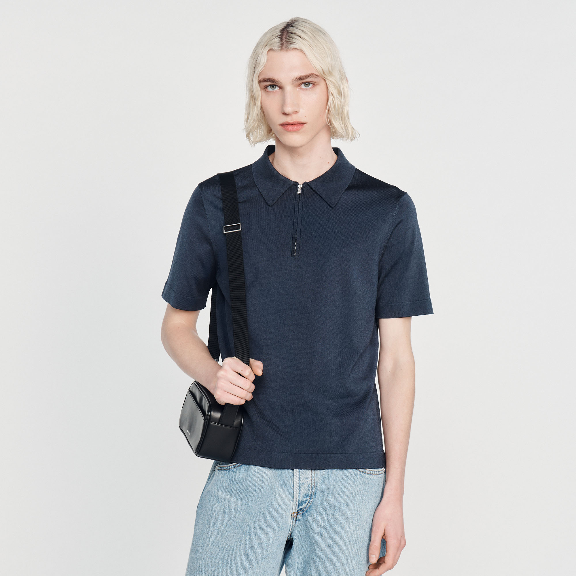 Polo en maille á col zippe