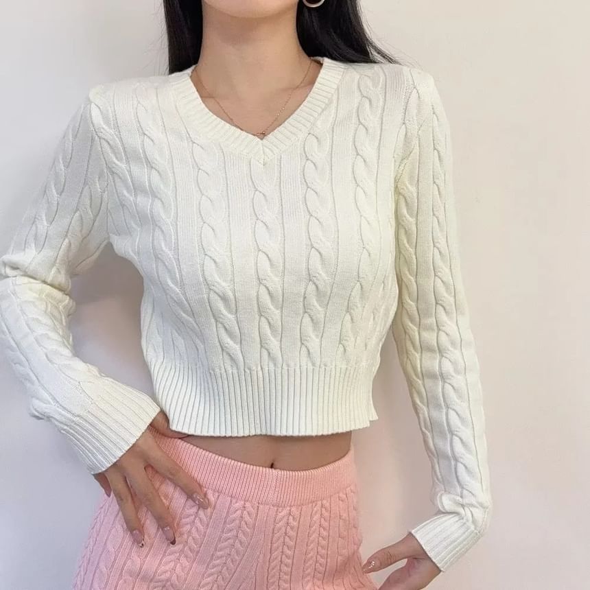 Asiris - Lange mouwen V-hals kabelgebreide crop top