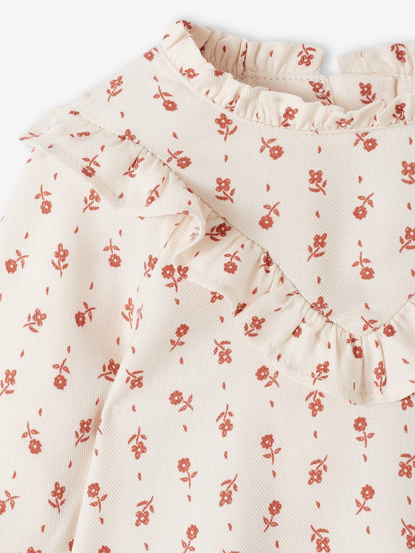 Blusa fluida com estampa floral para bebê na cor cru.