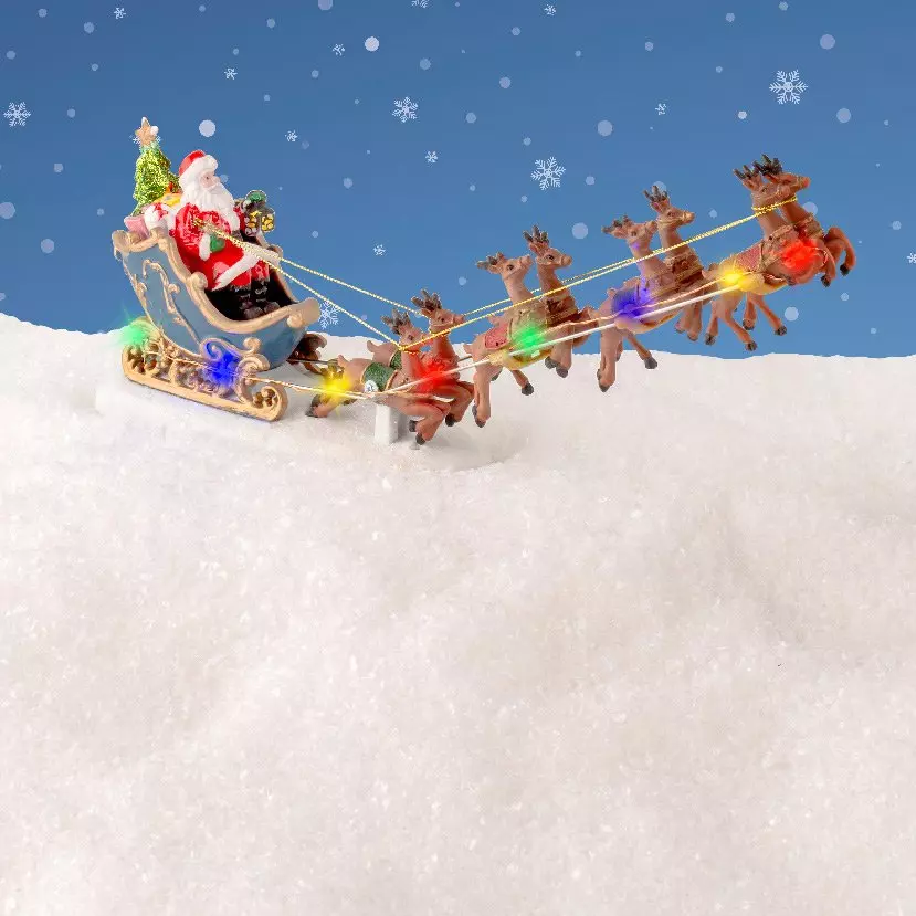 Traineau du Père Noël à piles en route pour sa tournée