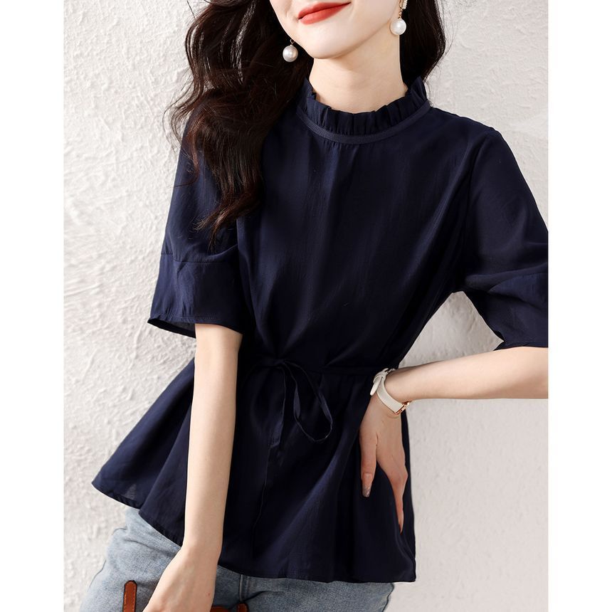 Jeonseon - Blouse met korte mouwen en een effen peplumhals