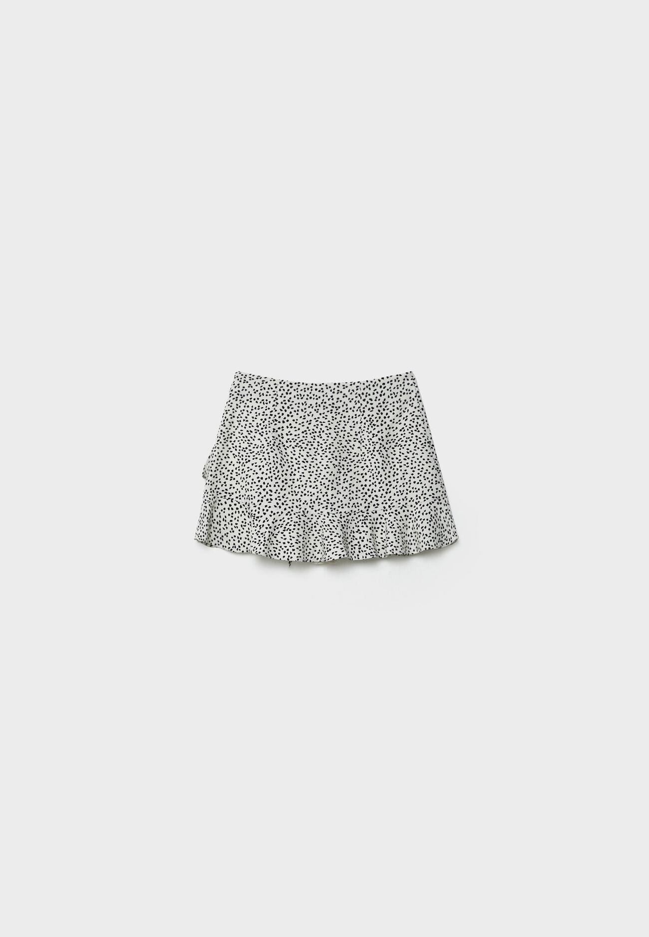 Shorts estampados em mistura de linho com babados.