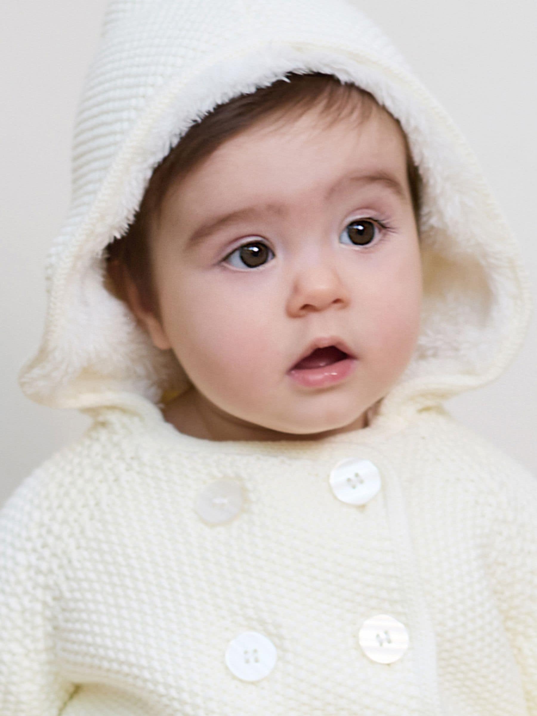 Crème - The Little Tailor Pixie babyjasje met pluizige voering van 100% katoen