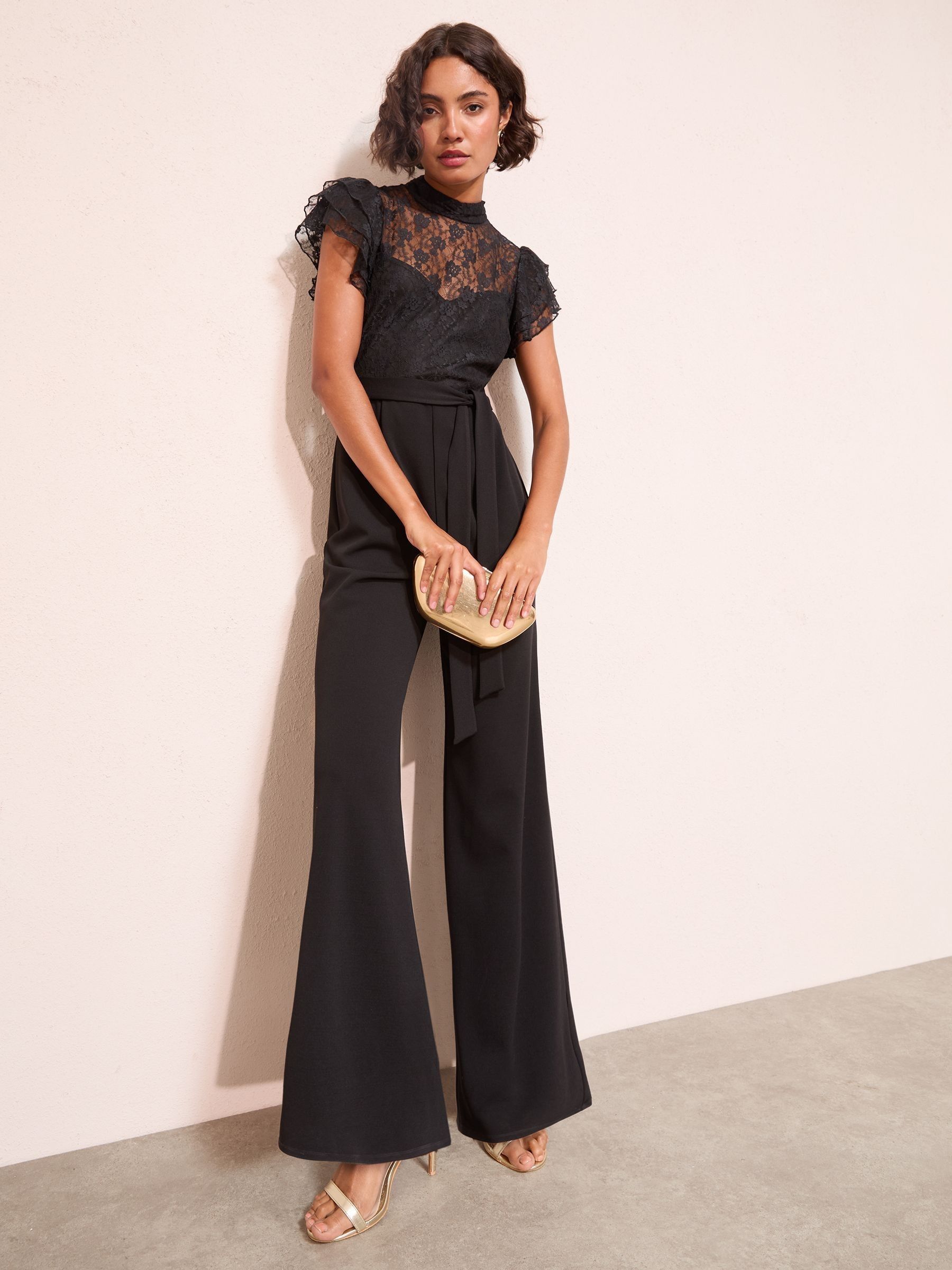 Zwart - Friends Like These jumpsuit van kant en scubamix met ruches aan de mouwen
