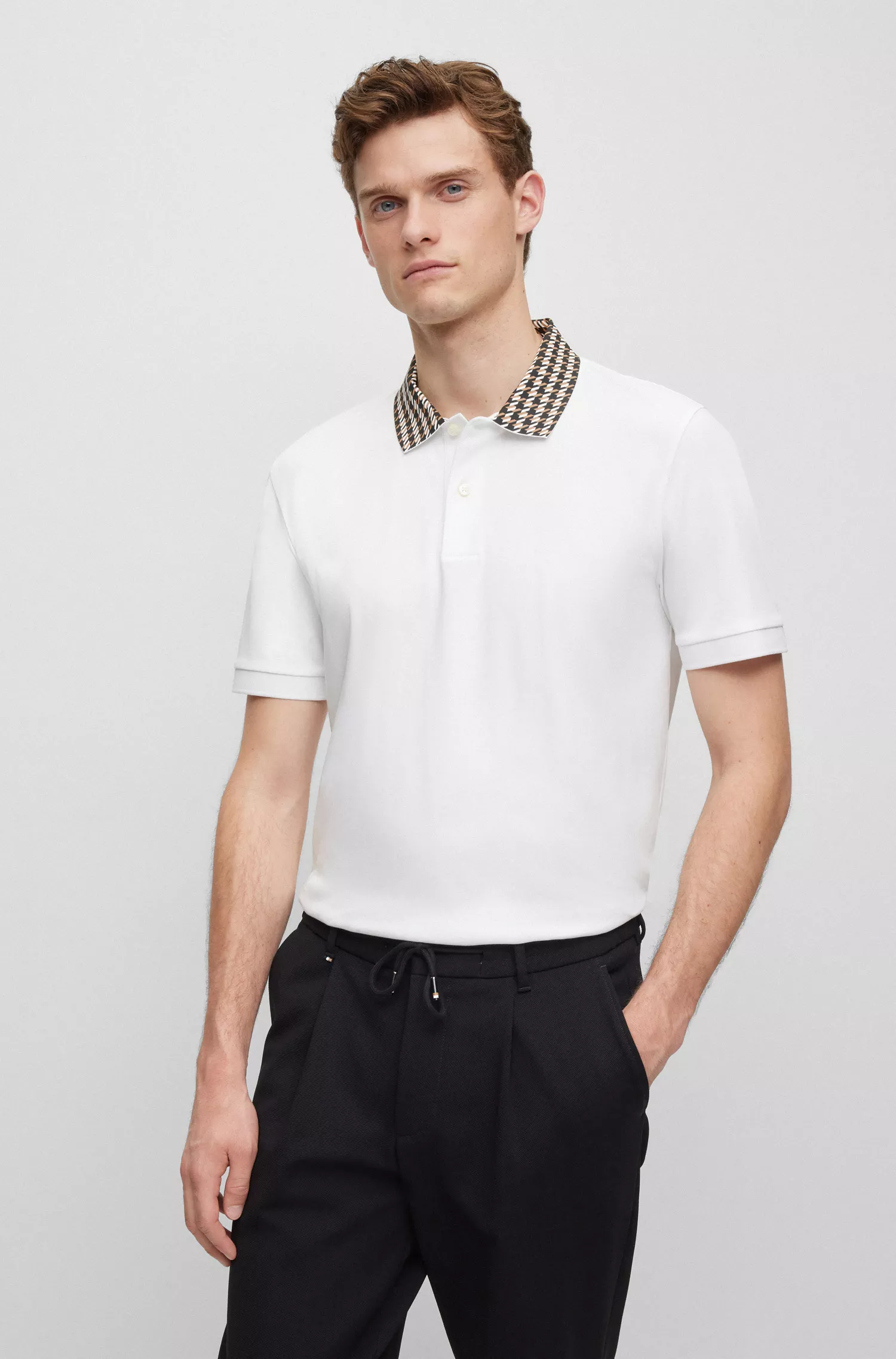 Camisa polo BOSS preta em algodão mercerizado com gola pied-de-poule.