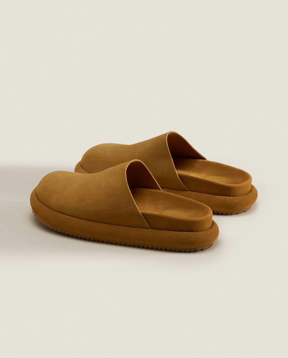 Chinelo mule de couro com detalhe na sola