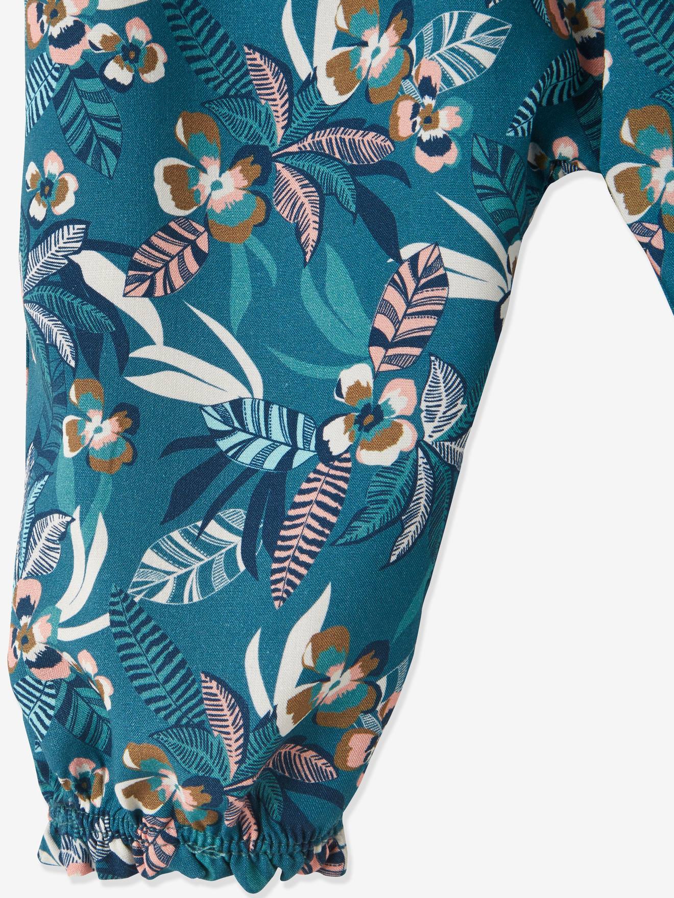 Calças fluidas estampadas para bebês na cor cru.
