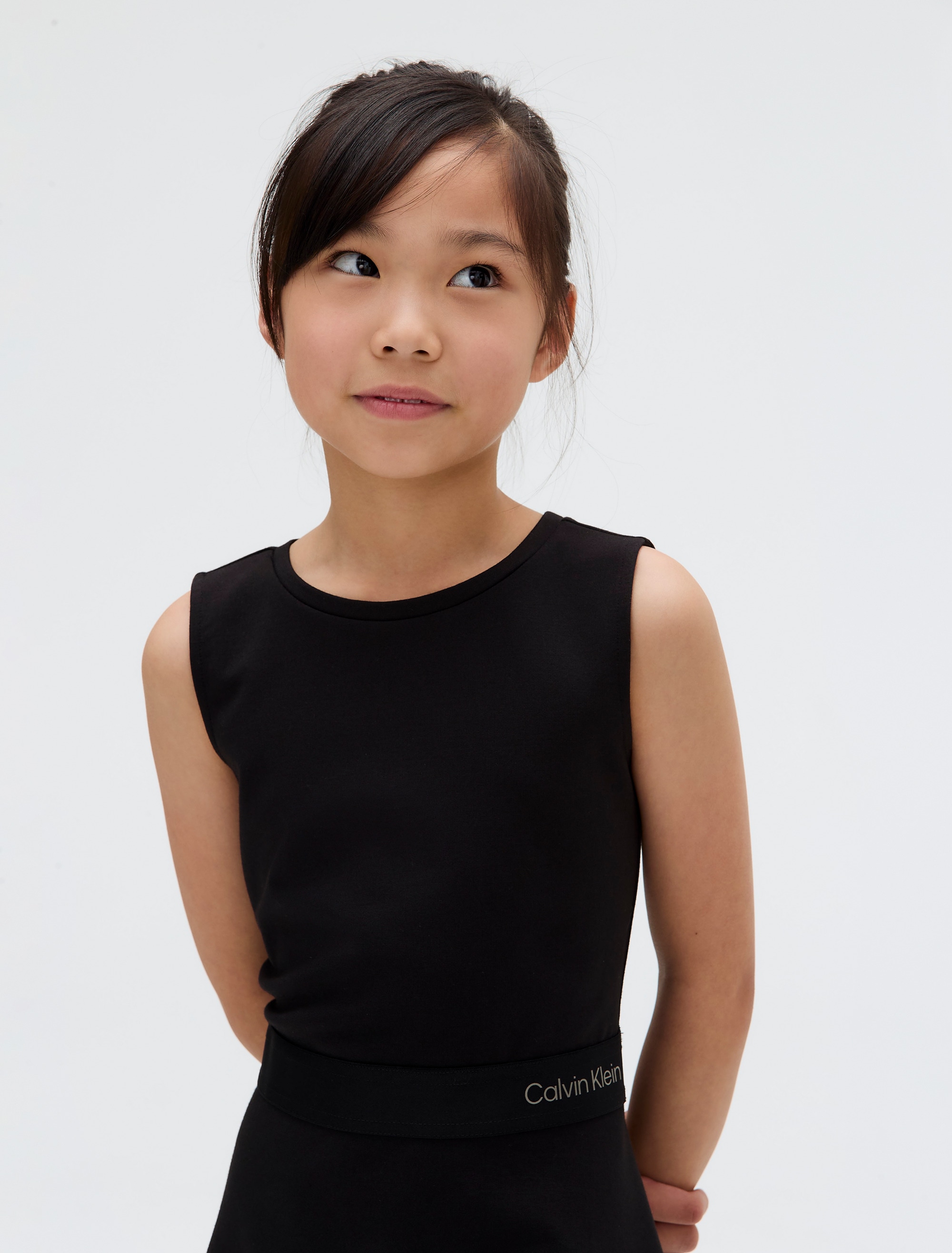 Calvin Klein Jeans Minikleid »FIT FLARE SLEEVELESS PUNTO DRESS« Logo-Tape-Besatz an der Taille