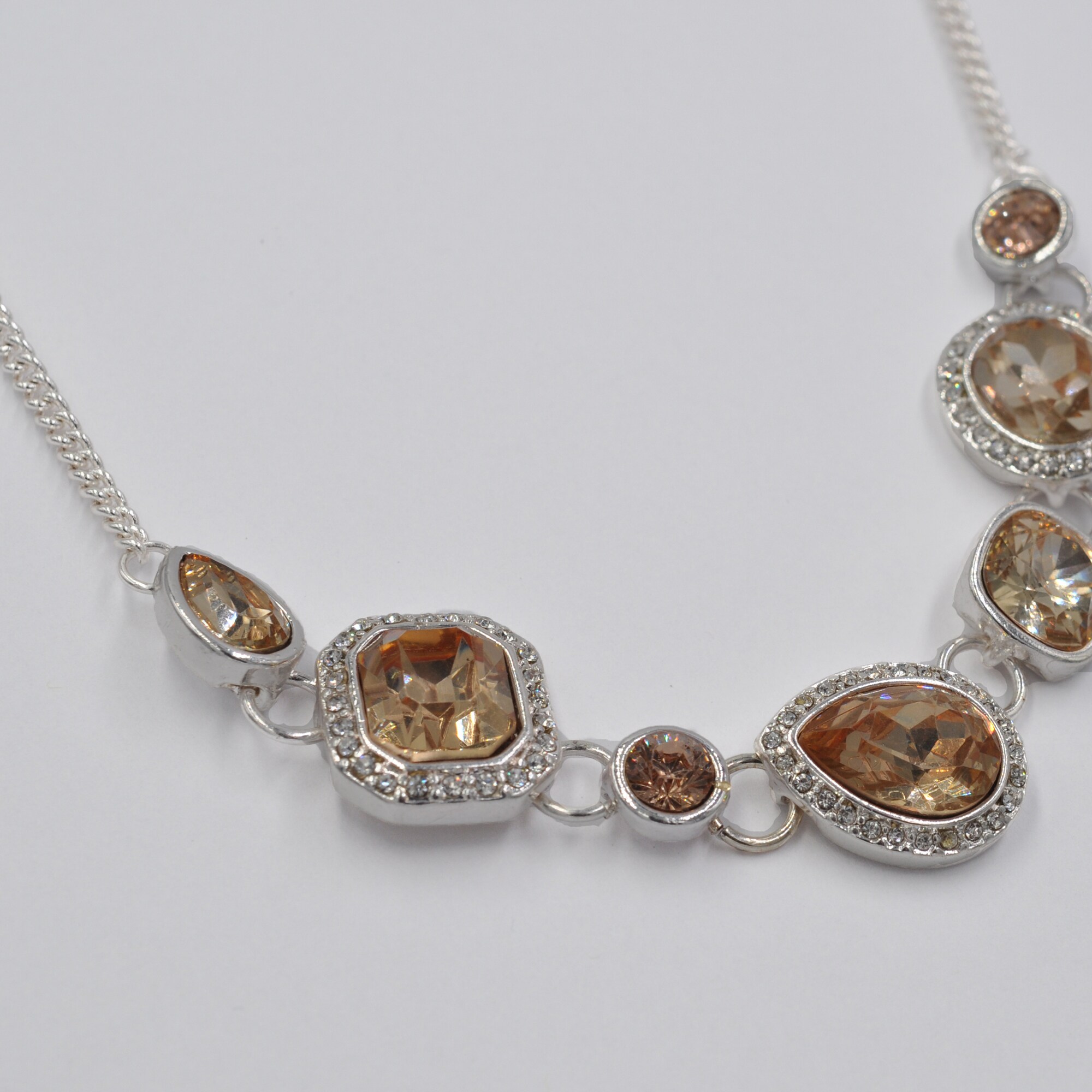 Steuer Modeschmuck Collierkette Metall Collier silberfarben mit Kristallzierde champagner