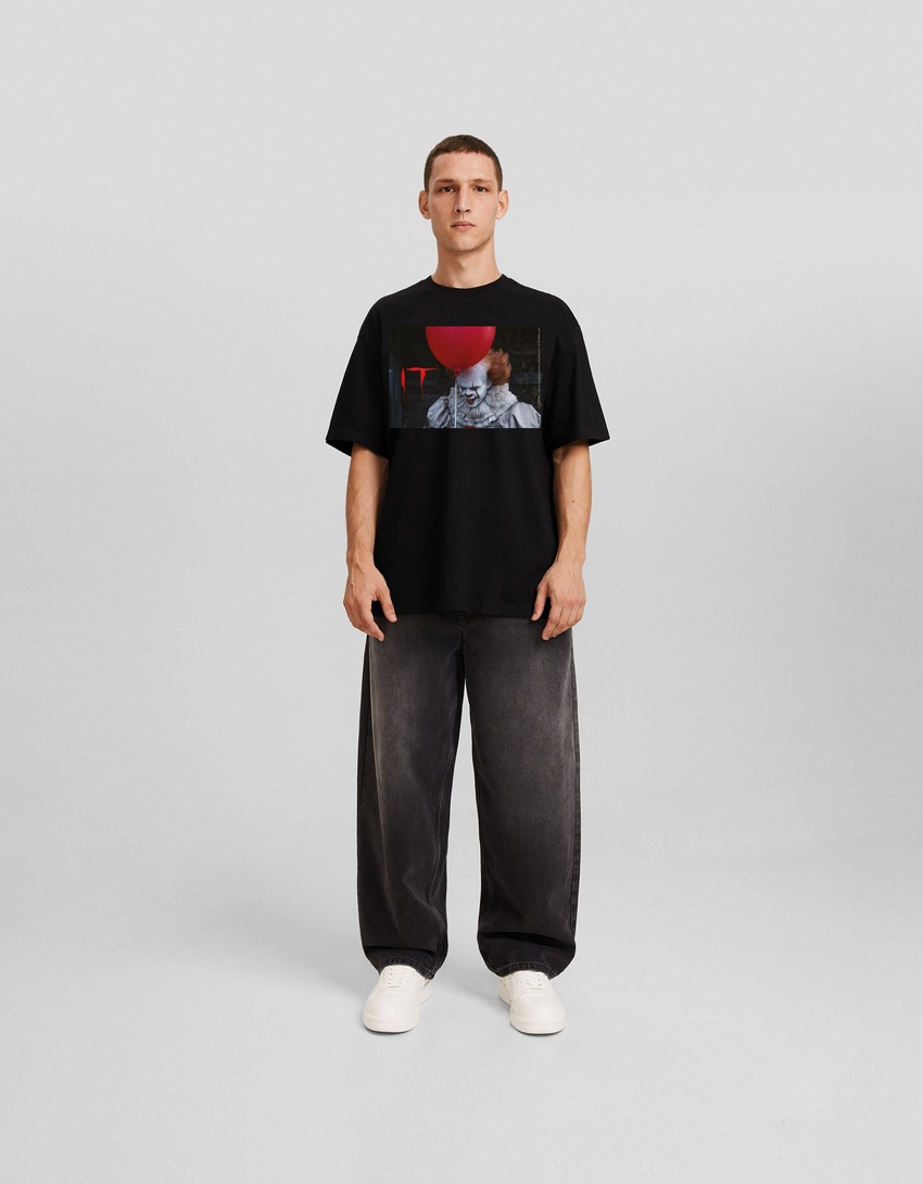 Camiseta oversized de manga curta com estampa de TI