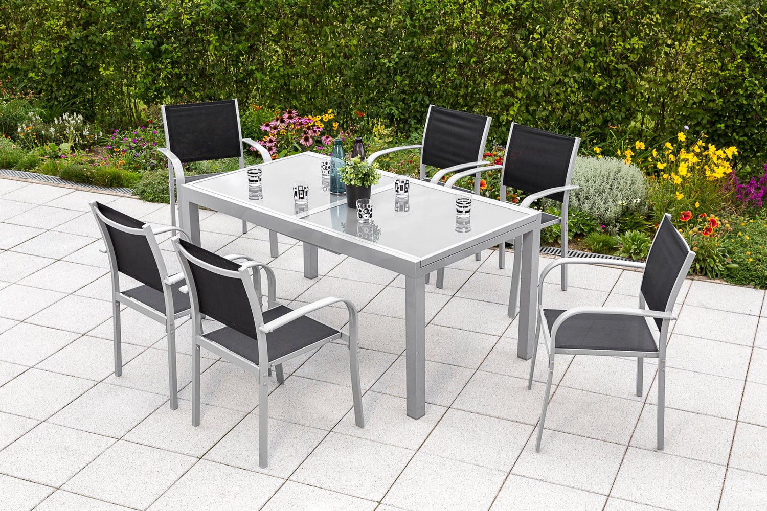 Ostia 7-delige tuinmeubelset, stapelbare stoelen, uitschuifbare tafel 160 (220) x 90 cm, zwart