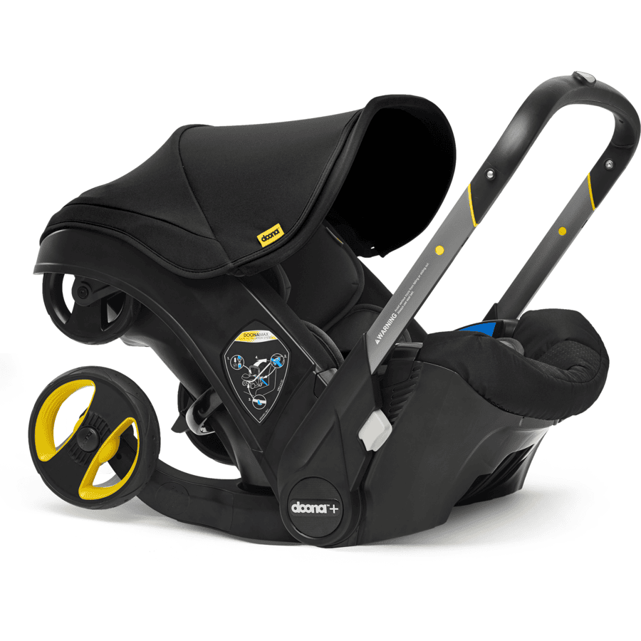 doona Babyschale Nitro Black  schwarz mit voll integriertem Fahrgestell, 2 in 1