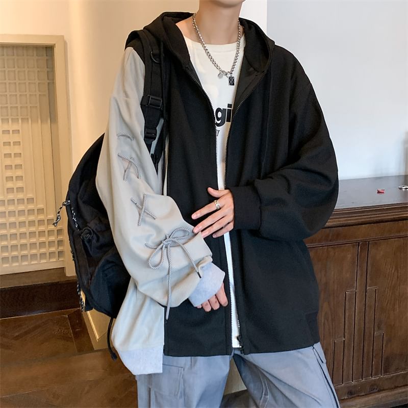 Derbundy - Tweekleurige oversized hoodie met vetersluiting en rits