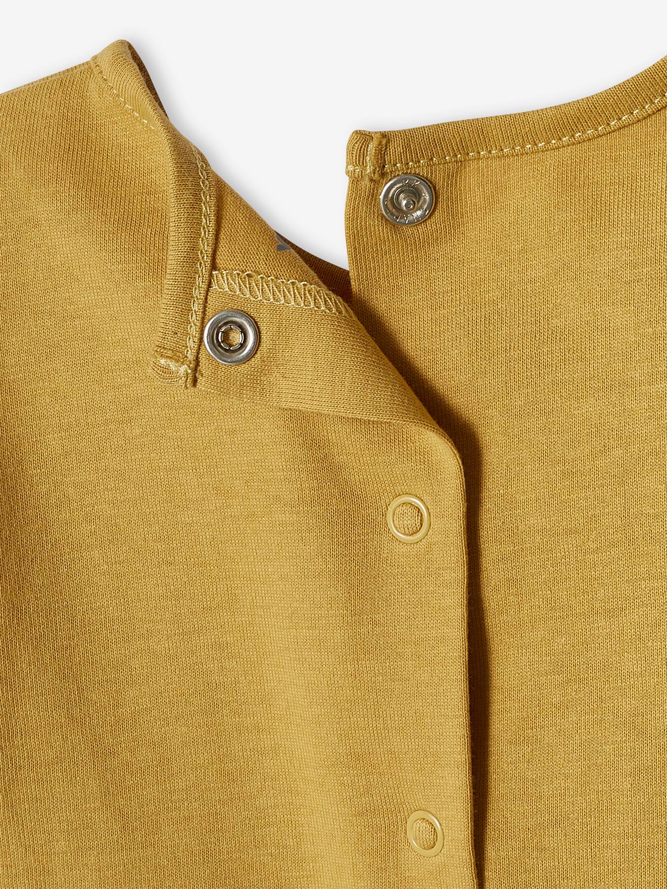 Conjunto de 2 camisetas básicas de manga comprida para bebês na cor amarelo claro.