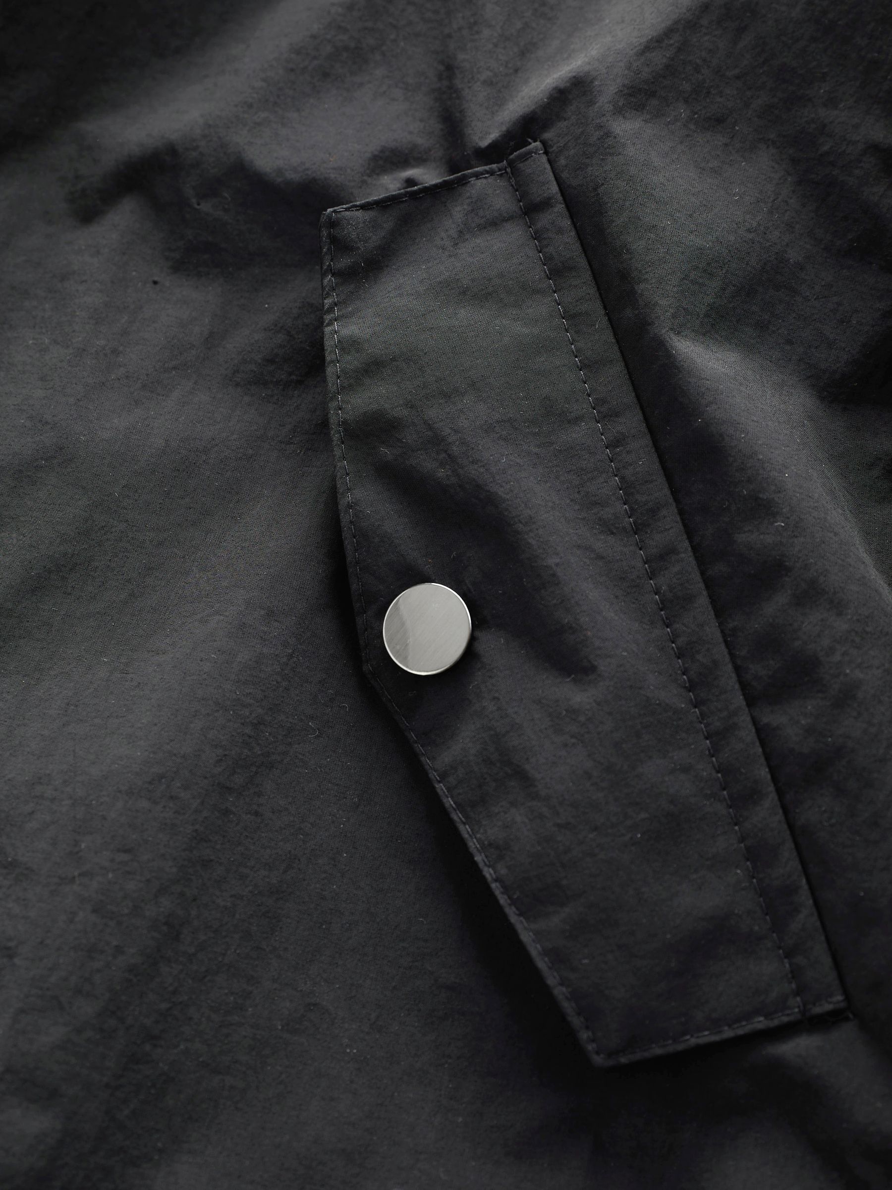 Zwart - Waterdichte Cagoule-jas (5-16jaar)