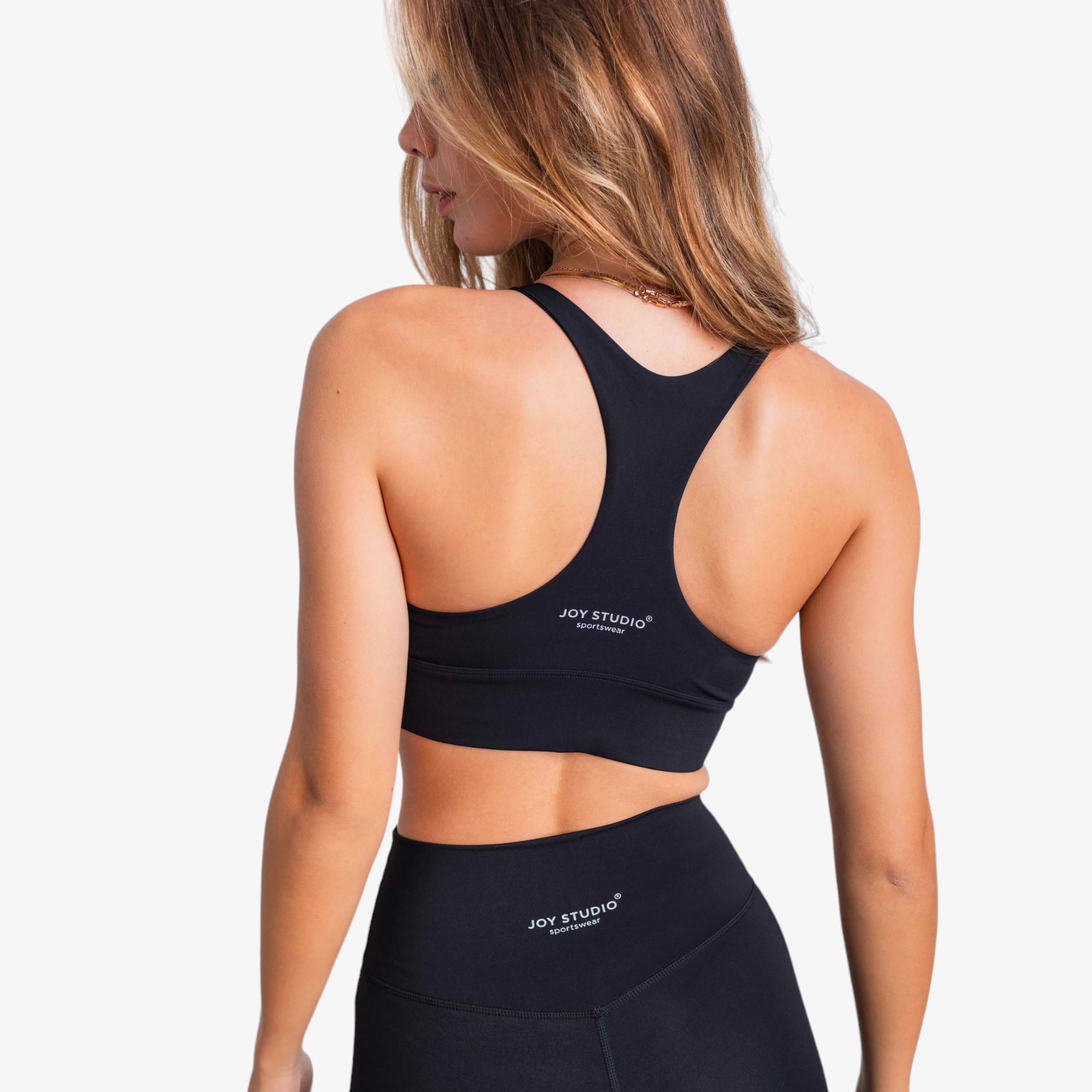 Top esportivo Joy Studio V Essential