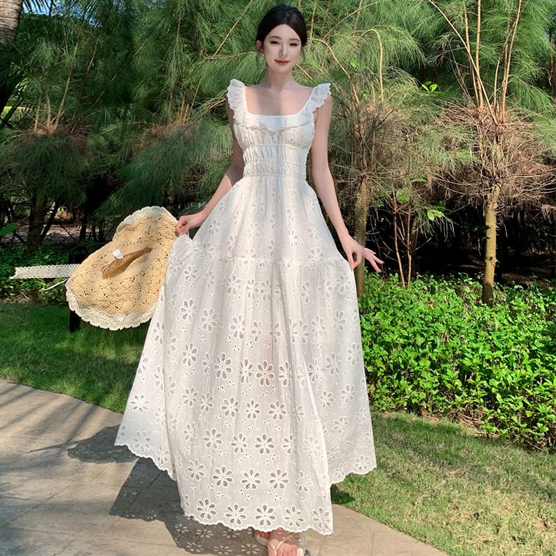 Juuri - Mouwloze maxi-jurk met geborduurde bloemen