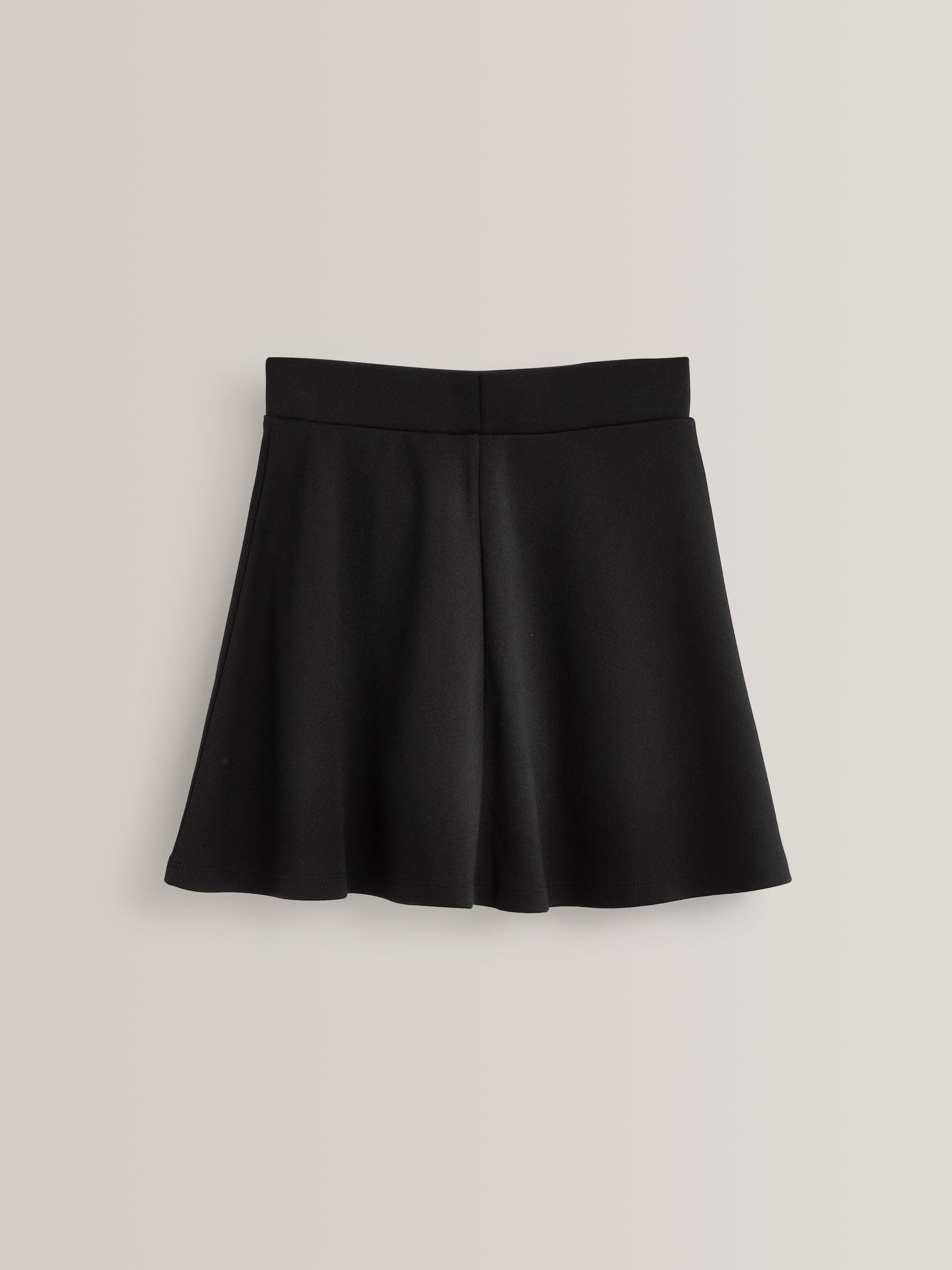 Zwart - Aantrekskirt voor school met jersey stretch (3-17jr)