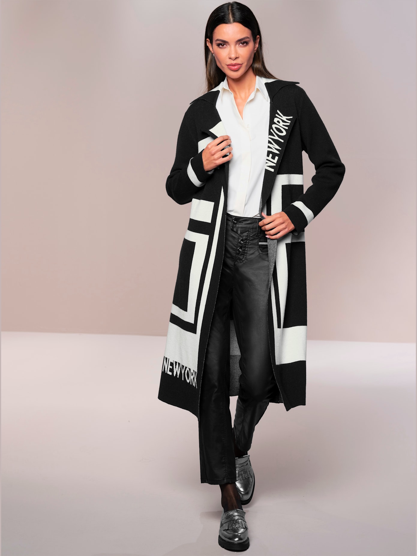 Manteau en tricot superbe et tendance