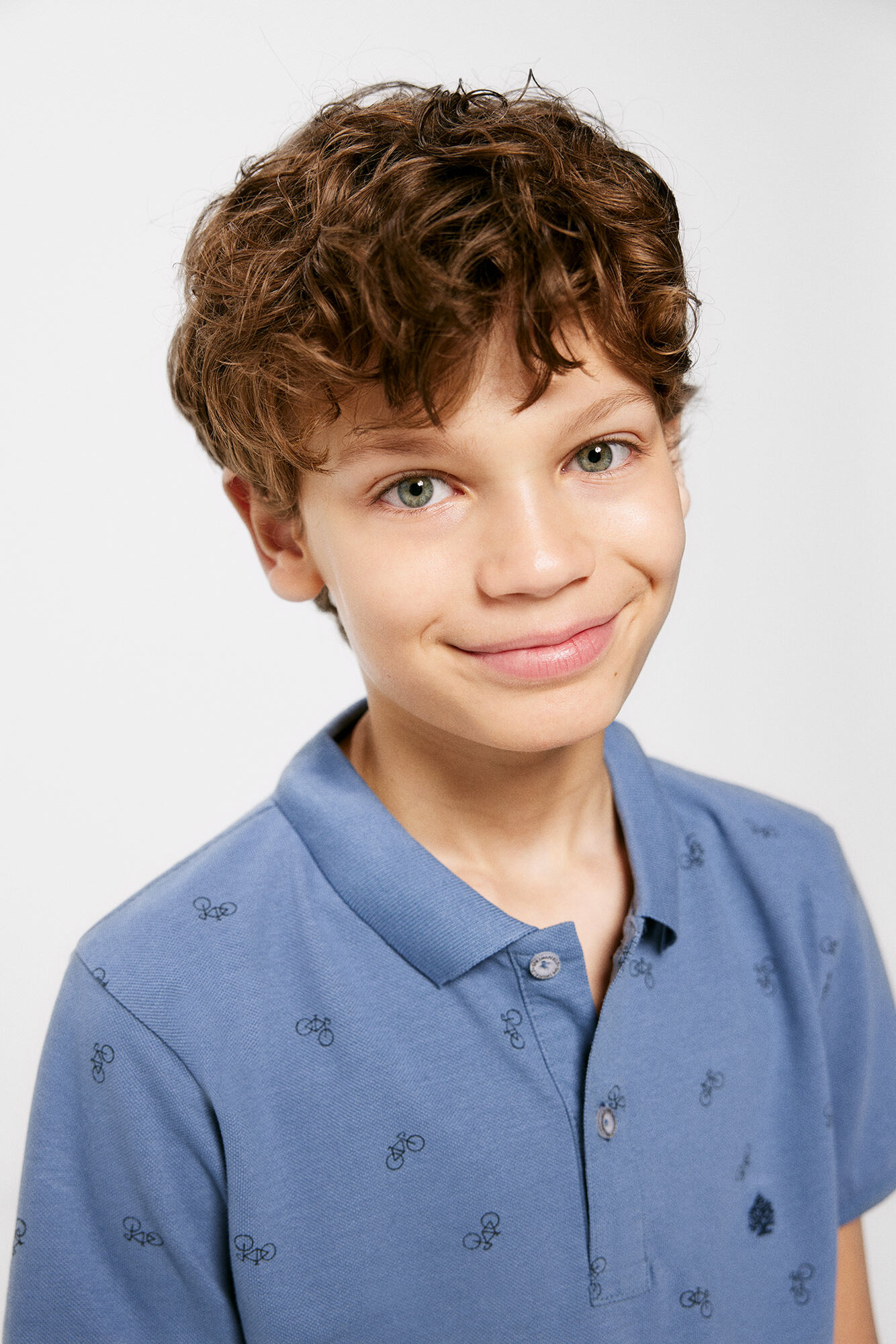Camisa polo infantil com estampa de bicicleta