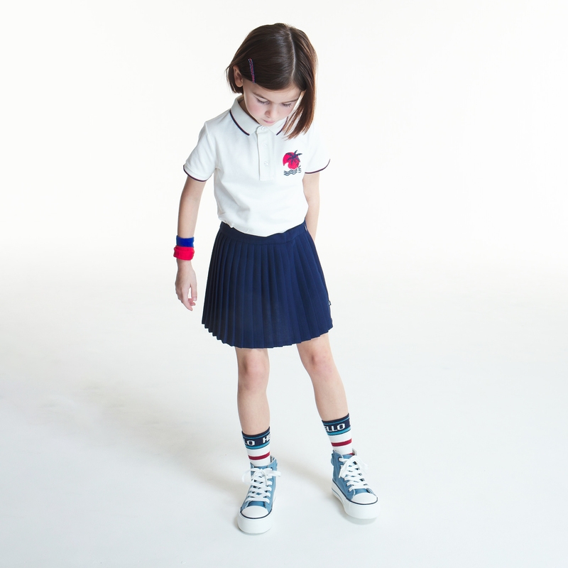 Jupe courte et plissée unie bleue fille