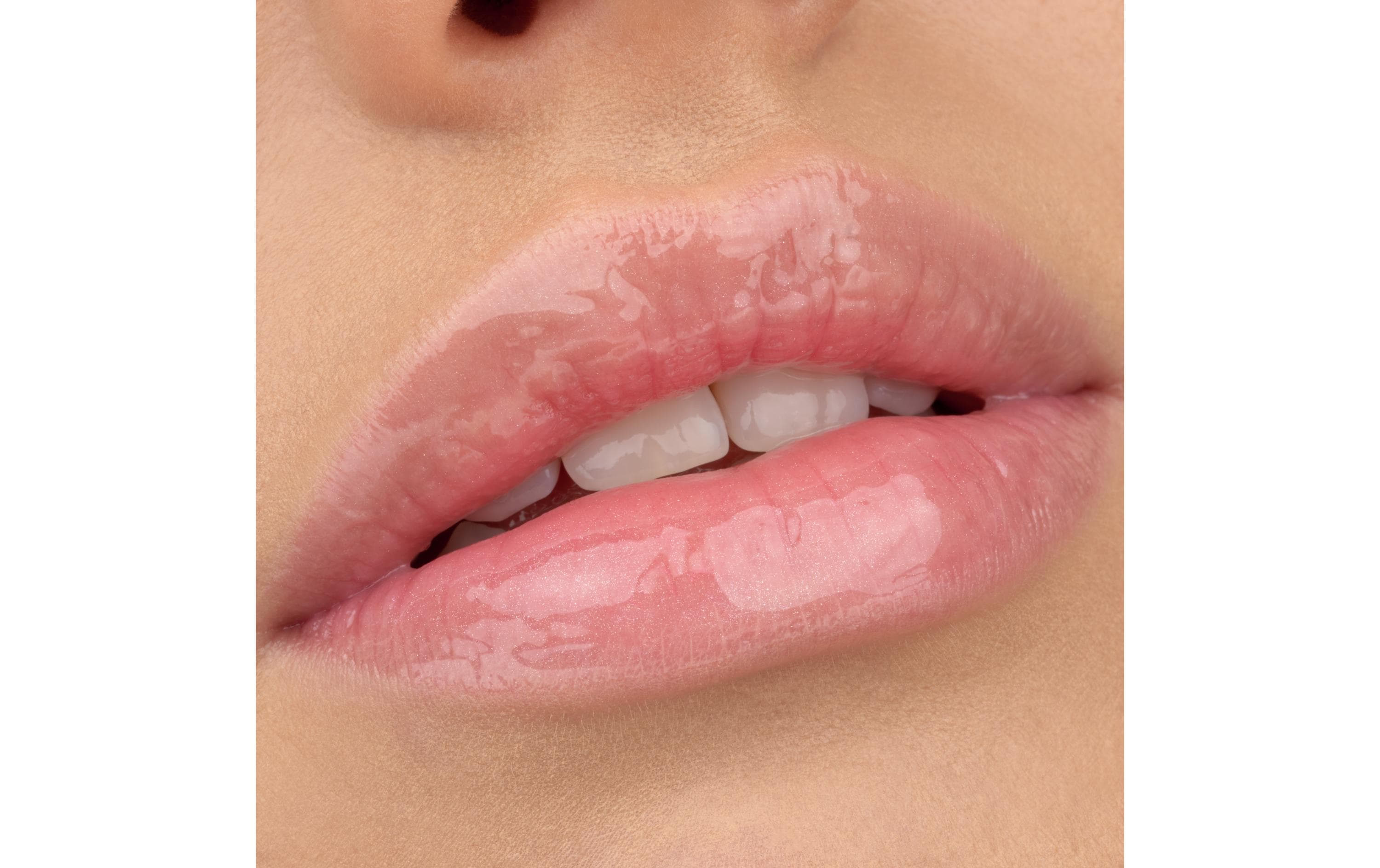 Lip Booster Juicy bomb shiny 101 Lovely LitchiLipgloss mit fruchtigem Duft und hochglänzendem Finish