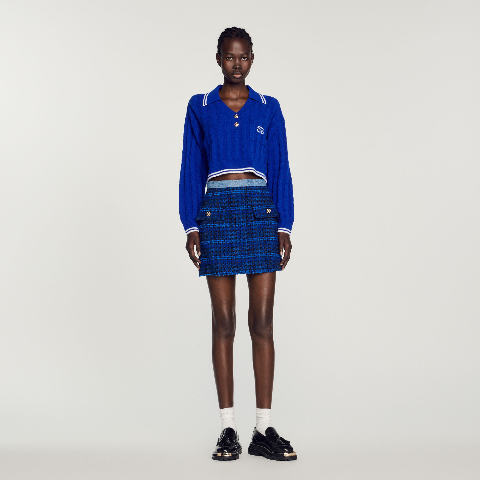 Pull court en maille torsadee