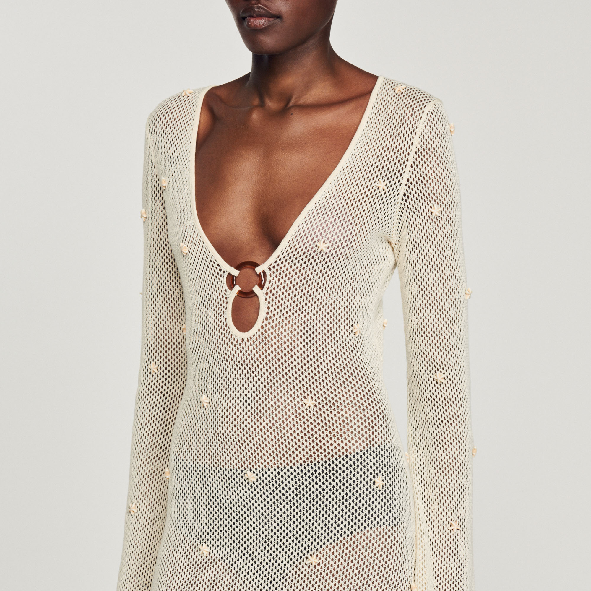 Robe longue en resille á pampille