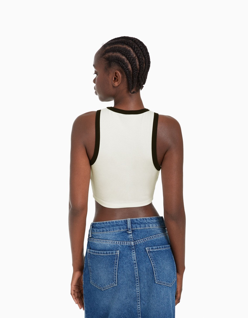 Camiseta cropped sem mangas com estampa de Jean-Michel Basquiat