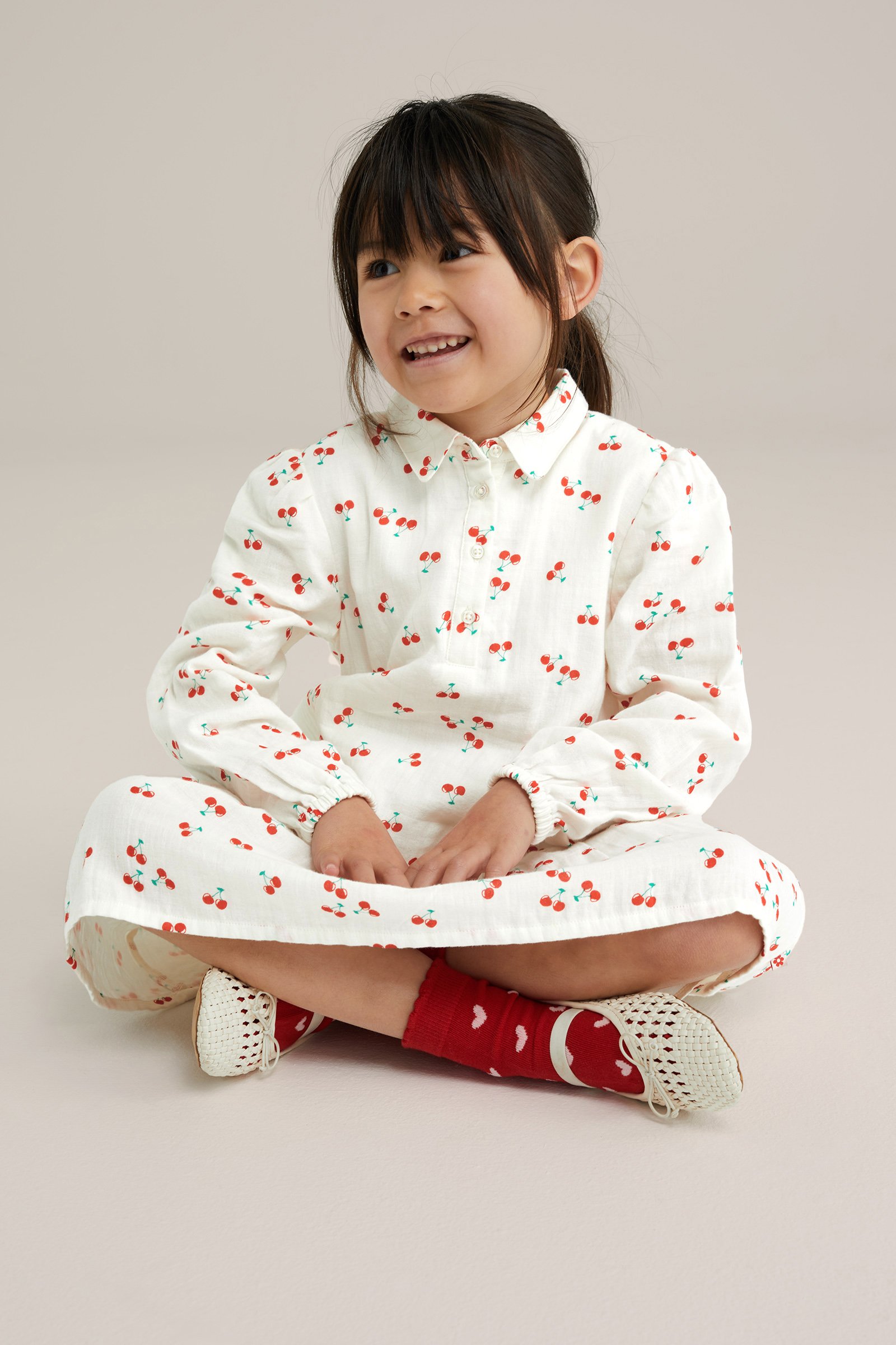 Meisjes jurk met dessin WE Fashion Gebroken wit