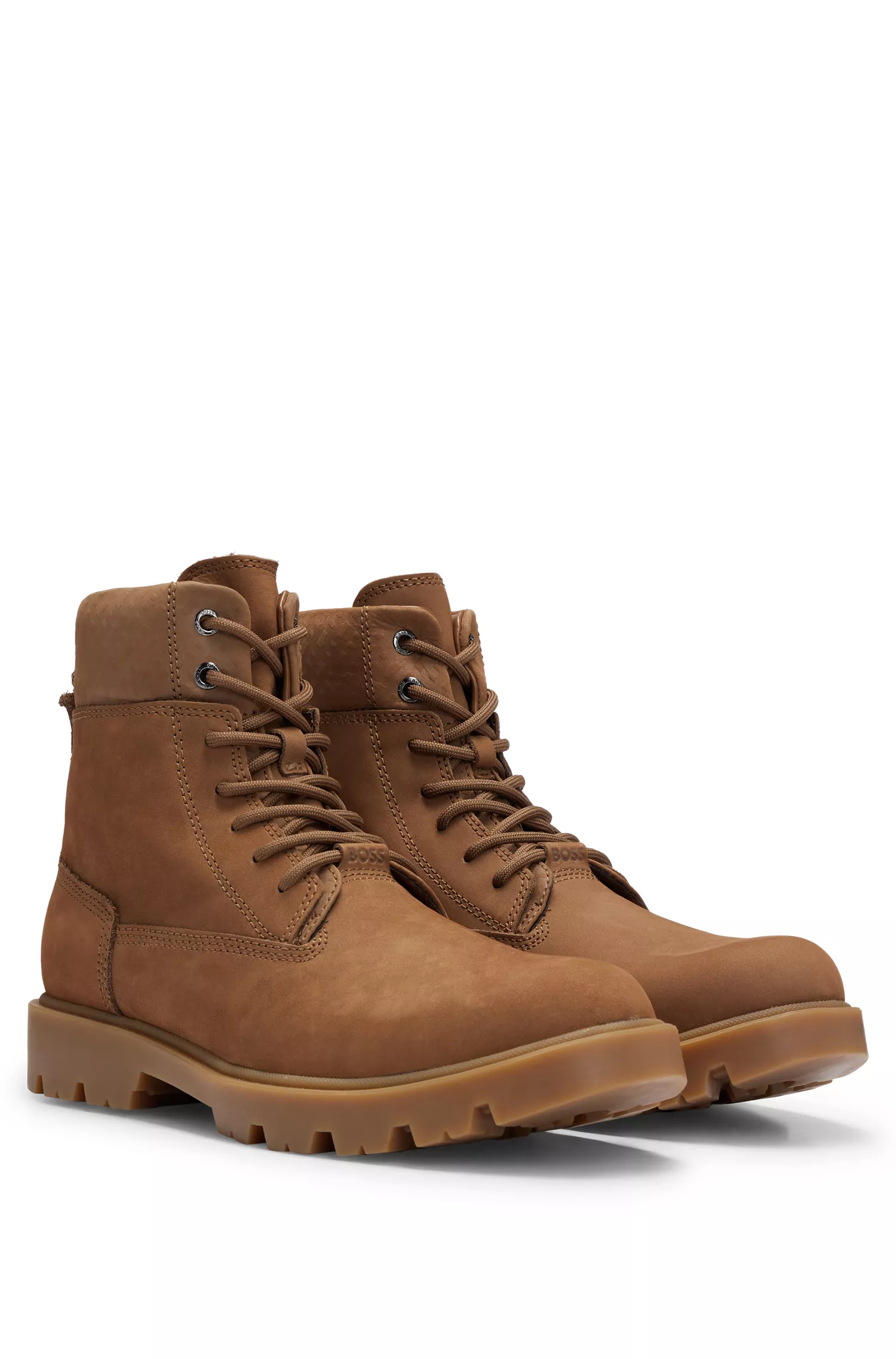 Botas de cano curto BOSS em camurça preta com colarinho monogramado em tom sobre tom.
